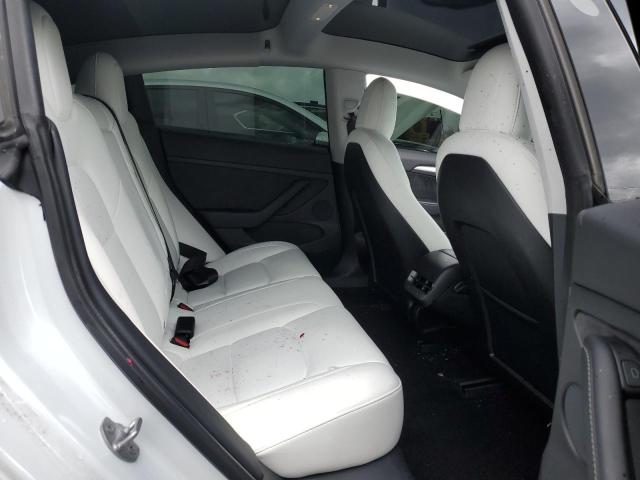 Photo 10 from auction – 2021 TESLA MODEL 3 with VIN 5YJ3E1EA6MF063794