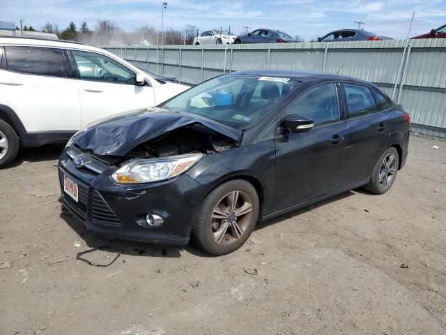 FORD FOCUS SE 2014 with VIN 1FADP3F25EL377913 - Photo from auction