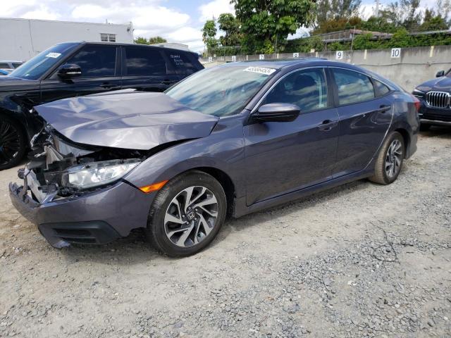 HONDA CIVIC EX 2018 with VIN 19XFC2F71JE025726 - Photo from auction