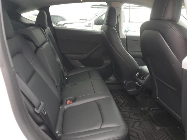 Photo 11 from auction – 2023 TESLA MODEL Y with VIN 7SAYGDEE6PF623308