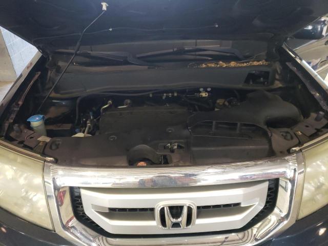 Фото 12 с аукциона – 2011 HONDA PILOT TOUR с VIN 5FNYF4H95BB016792