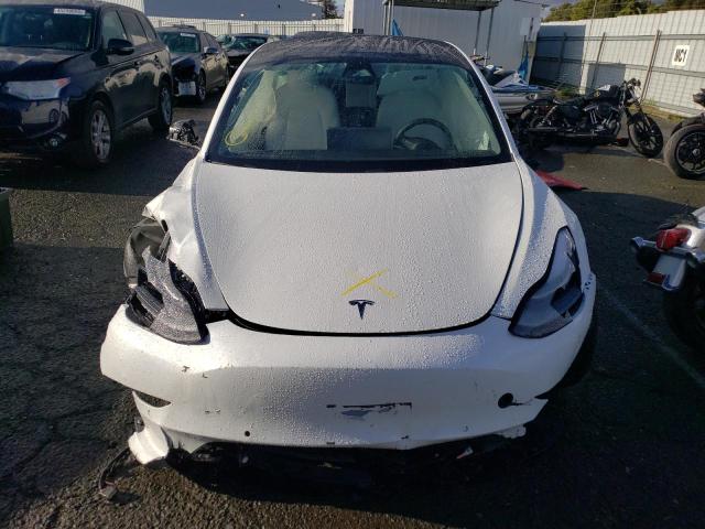 Photo 5 from auction – 2021 TESLA MODEL 3 with VIN 5YJ3E1EB0MF032548