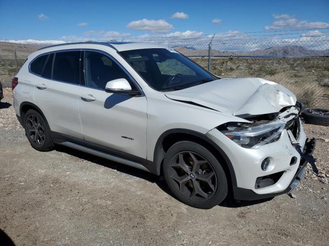 Photo 4 from auction – 2017 BMW X1 XDRIVE2 with VIN WBXHT3C32H5F84987