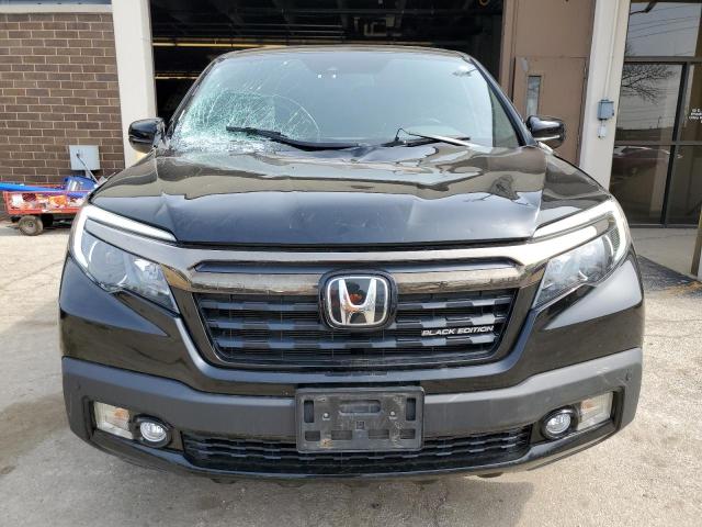 Photo 5 from auction – 2017 HONDA RIDGELINE with VIN 5FPYK3F88HB023817