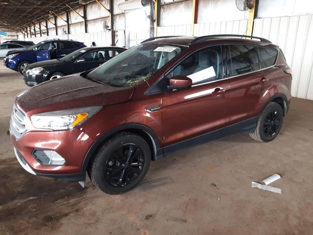 FORD ESCAPE SE 2018 with VIN 1FMCU0GD4JUB74041 - Photo from auction