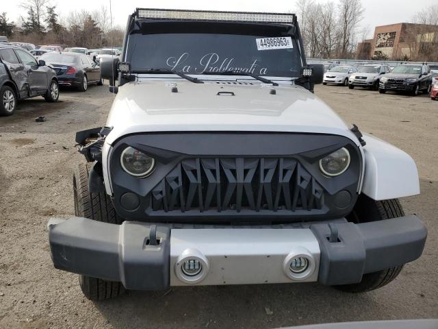 Photo 5 from auction – 2011 JEEP WRANGLER U with VIN 1J4HA5H1XBL619288