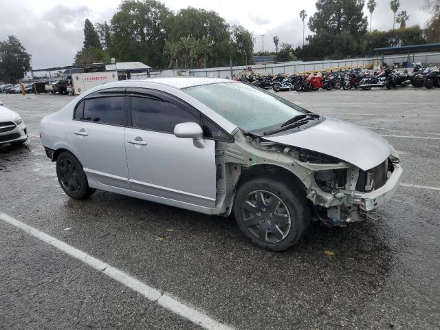 Photo 4 from auction – 2011 HONDA CIVIC LX with VIN 2HGFA1F57BH308752