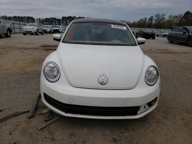 Photo 5 from auction – 2013 VOLKSWAGEN BEETLE with VIN 3VWJP7AT7DM676155