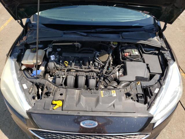 Photo 11 from auction – 2015 FORD FOCUS SE with VIN 1FADP3F23FL216770