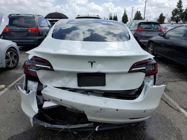 Photo 6 from auction – 2021 TESLA MODEL 3 with VIN 5YJ3E1EA6MF063794