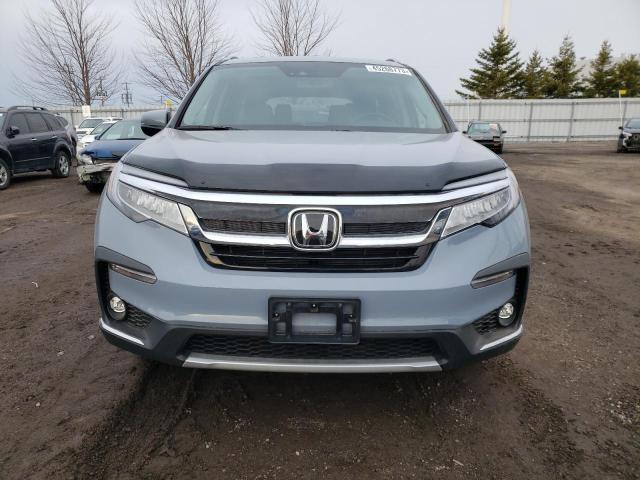 Photo 5 from auction – 2022 HONDA PILOT TOUR with VIN 5FNYF6H69NB506576