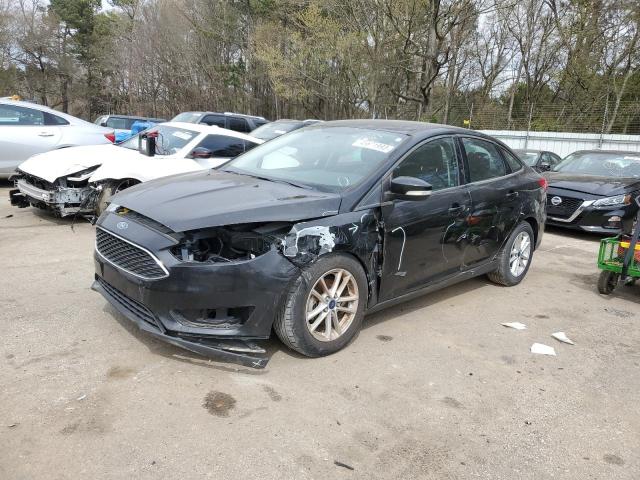 FORD FOCUS SE 2015 with VIN 1FADP3F21FL227279 - Photo from auction
