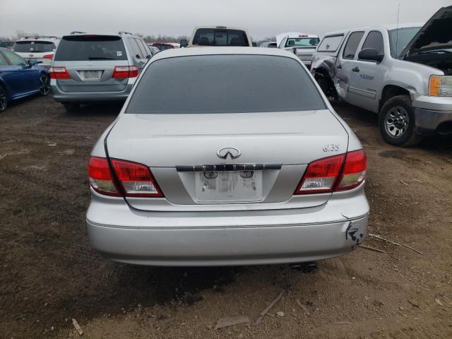 Photo 6 from auction – 2002 INFINITI I35 with VIN JNKDA31A12T004730
