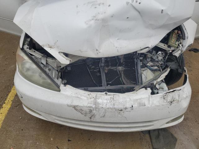 Photo 11 from auction – 2003 TOYOTA CAMRY LE with VIN 4T1BE32K63U255996