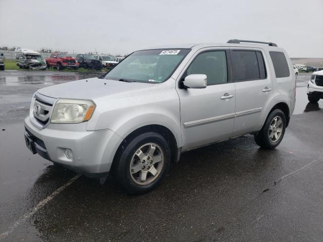 HONDA PILOT TOUR 2010 with VIN 5FNYF3H92AB001482 - Photo from auction