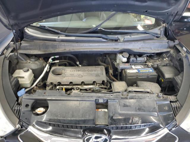 Photo 12 from auction – 2013 HYUNDAI TUCSON with VIN KM8JUCAC3DU622752