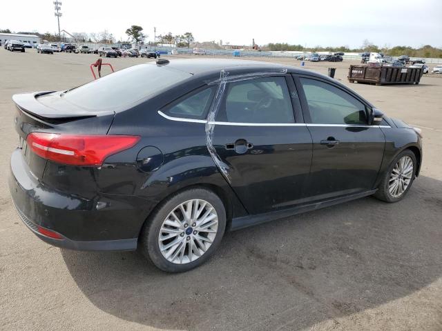 Photo 3 from auction – 2016 FORD FOCUS TITA with VIN 1FADP3J25GL260049