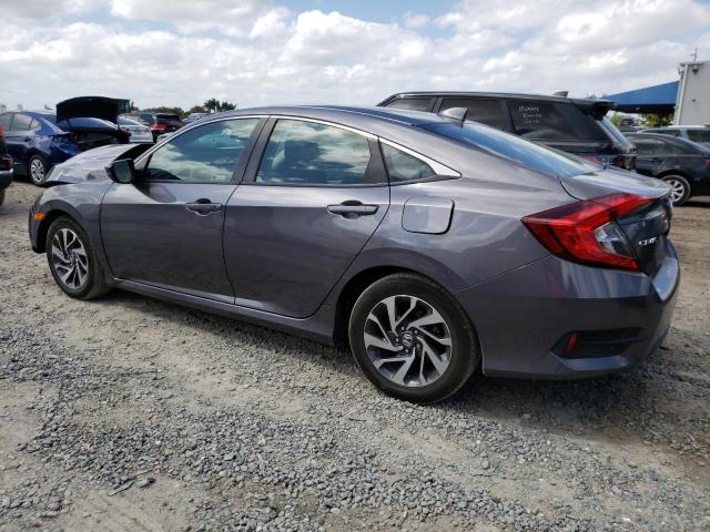 Photo 2 from auction – 2018 HONDA CIVIC EX with VIN 19XFC2F71JE025726