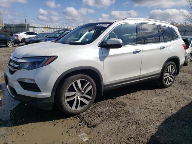 HONDA PILOT TOUR 2018 with VIN 5FNYF6H97JB047150 - Photo from auction