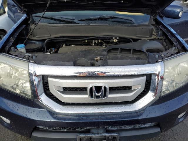 Photo 12 from auction – 2011 HONDA PILOT TOUR with VIN 5FNYF4H9XBB068242