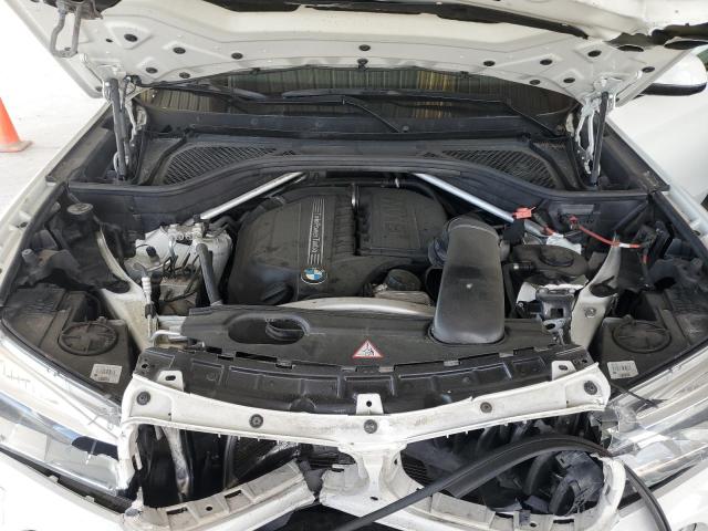 Photo 12 from auction – 2014 BMW X5 XDRIVE3 with VIN 5UXKR0C5XE0H23126