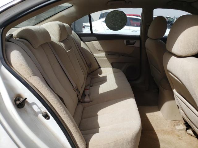 Photo 10 from auction – 2006 KIA OPTIMA LX with VIN KNAGE123165047236