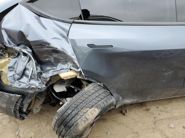 Photo 10 from auction – 2021 TESLA MODEL Y with VIN 5YJYGDED6MF103836