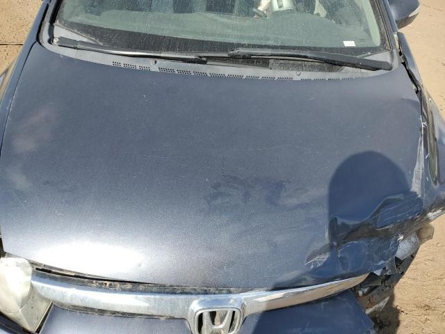 Photo 11 from auction – 2007 HONDA CIVIC HYBR with VIN JHMFA36207S001020