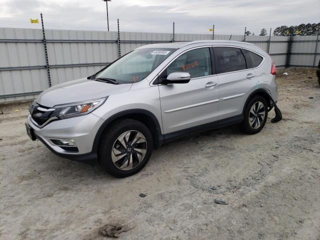 HONDA CR-V TOURI 2015 with VIN 5J6RM4H91FL064555 - Photo from auction