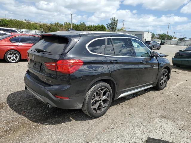 Photo 3 from auction – 2019 BMW X1 XDRIVE2 with VIN WBXHT3C52K5L97982