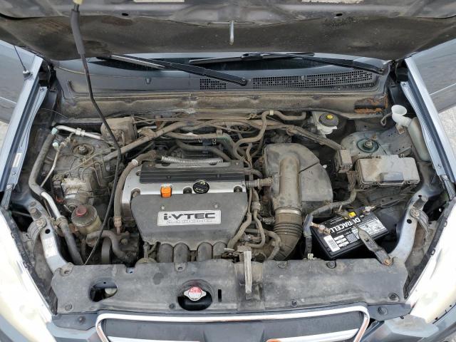 Photo 12 from auction – 2006 HONDA CR-V SE with VIN JHLRD78916C027273