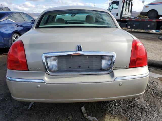 Photo 6 from auction – 2004 LINCOLN TOWN CAR E with VIN 1LNHM81W24Y684612