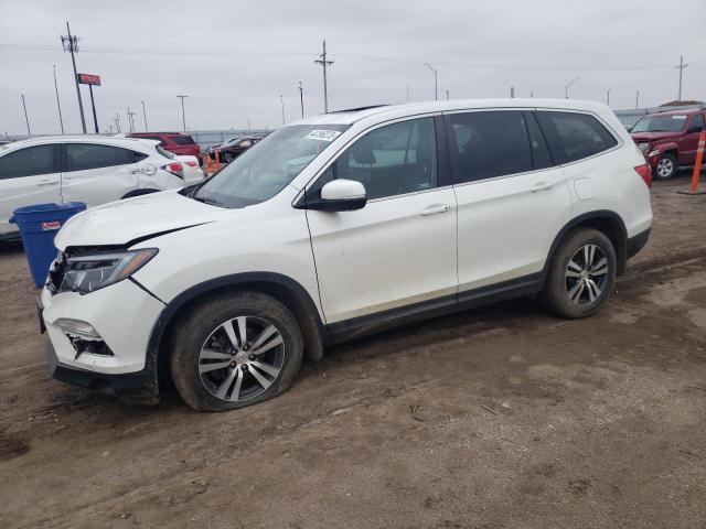 HONDA PILOT EXL 2018 with VIN 5FNYF6H57JB061790 - Photo from auction