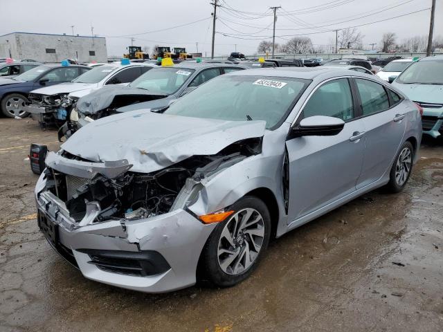 HONDA CIVIC EX 2018 with VIN 2HGFC2F72JH585969 - Photo from auction