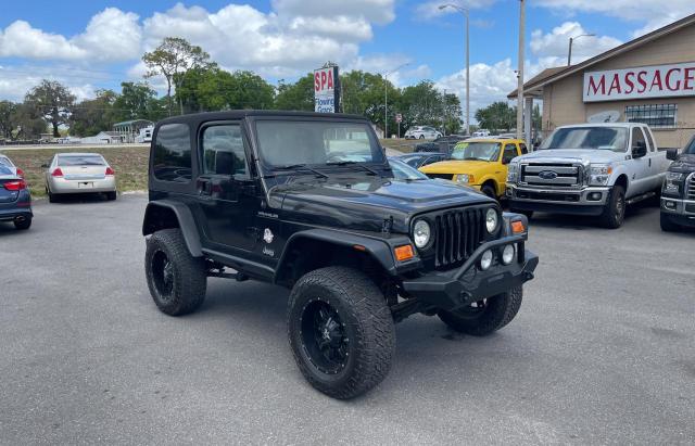 JEEP WRANGLER / 2000 with VIN 1J4FA59S0YP708044 - Photo from auction
