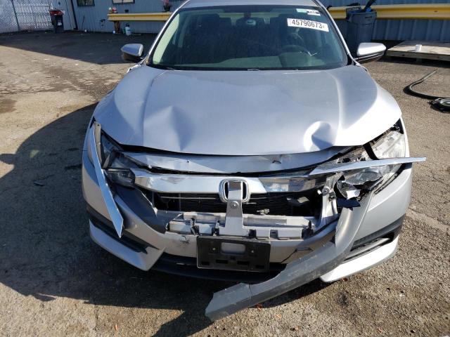 Photo 11 from auction – 2018 HONDA CIVIC EX with VIN 2HGFC2F79JH520830