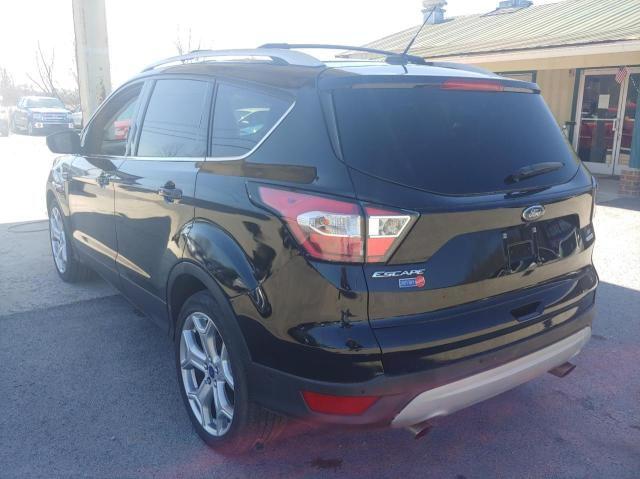 Photo 3 from auction – 2017 FORD ESCAPE TIT with VIN 1FMCU0J98HUD72118