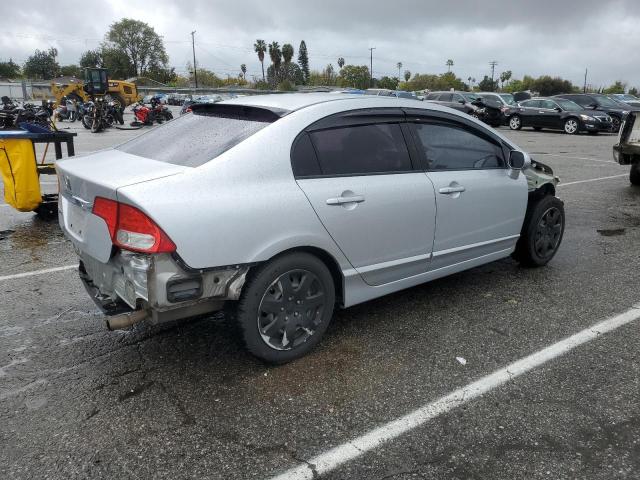 Photo 3 from auction – 2011 HONDA CIVIC LX with VIN 2HGFA1F57BH308752