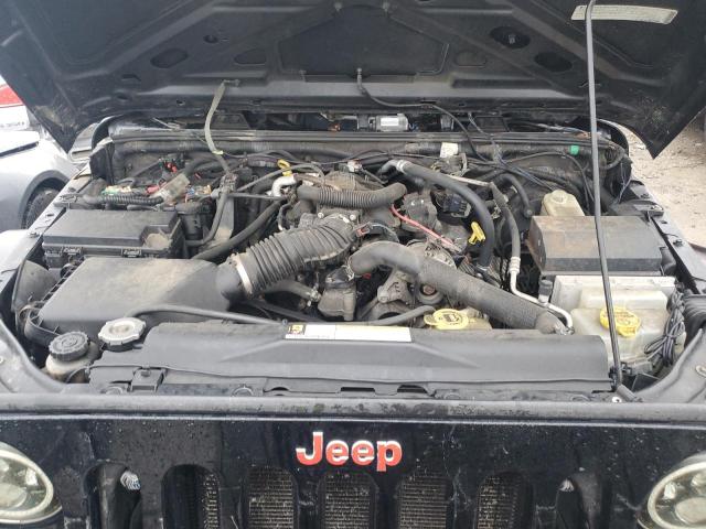 Photo 11 from auction – 2009 JEEP WRANGLER U with VIN 1J4GA39159L738701