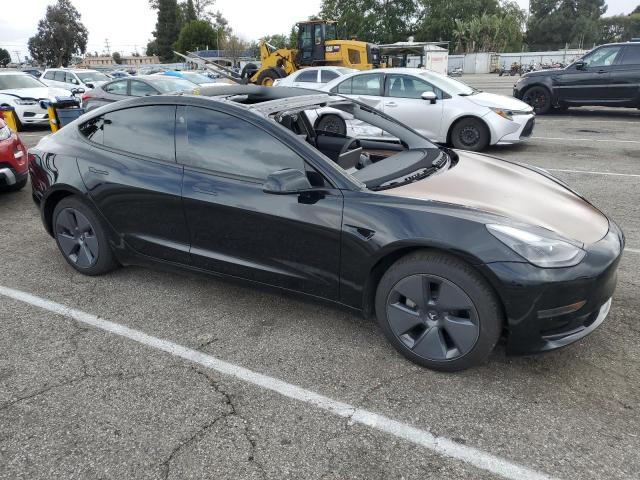 Photo 4 from auction – 2022 TESLA MODEL 3 with VIN 5YJ3E1EA9NF301879