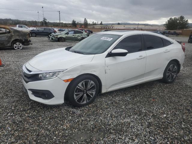 Photo 1 from auction – 2018 HONDA CIVIC EX with VIN JHMFC1F39JX013958