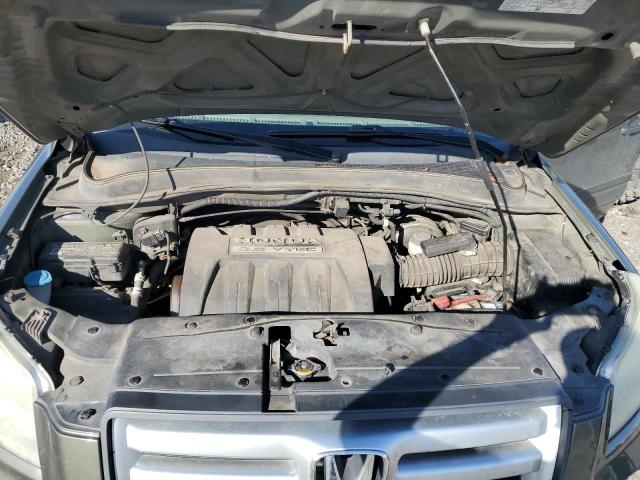 Photo 11 from auction – 2006 HONDA PILOT EX with VIN 2HKYF18516H521151