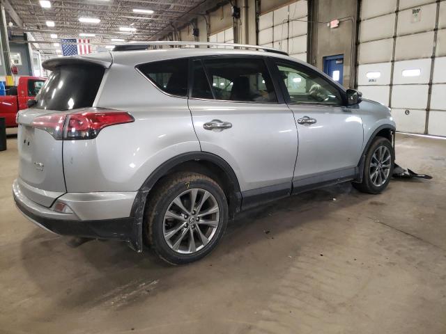 Photo 3 from auction – 2018 TOYOTA RAV4 LIMIT with VIN JTMDFREV8JJ249876