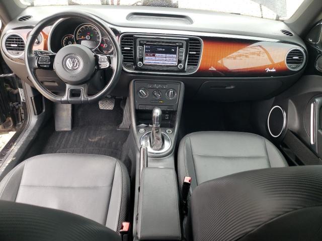 Photo 8 from auction – 2013 VOLKSWAGEN BEETLE with VIN 3VWJP7AT8DM677427