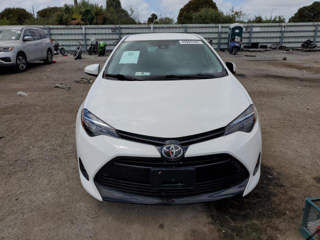 Photo 5 from auction – 2017 TOYOTA COROLLA L with VIN 5YFBURHE1HP676329