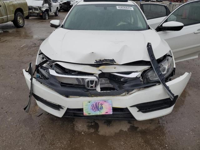 Photo 11 from auction – 2017 HONDA CIVIC EX with VIN 19XFC2F73HE014494