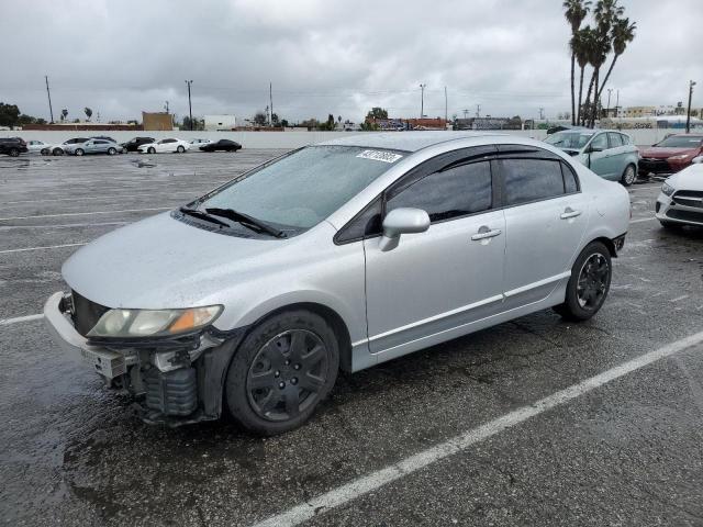 HONDA CIVIC LX 2011 with VIN 2HGFA1F57BH308752 - Photo from auction