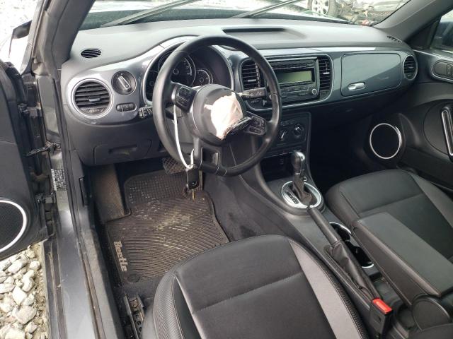 Photo 8 from auction – 2014 VOLKSWAGEN BEETLE with VIN 3VWJ07AT6EM662494