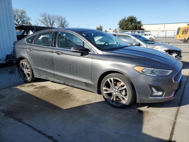 Photo 4 from auction – 2019 FORD FUSION TIT with VIN 3FA6P0D96KR184528
