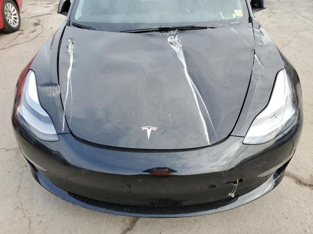 Photo 11 from auction – 2022 TESLA MODEL 3 with VIN 5YJ3E1EB5NF207474